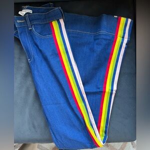 Alice + Olivia wide leg jeans with rainbow down the side.